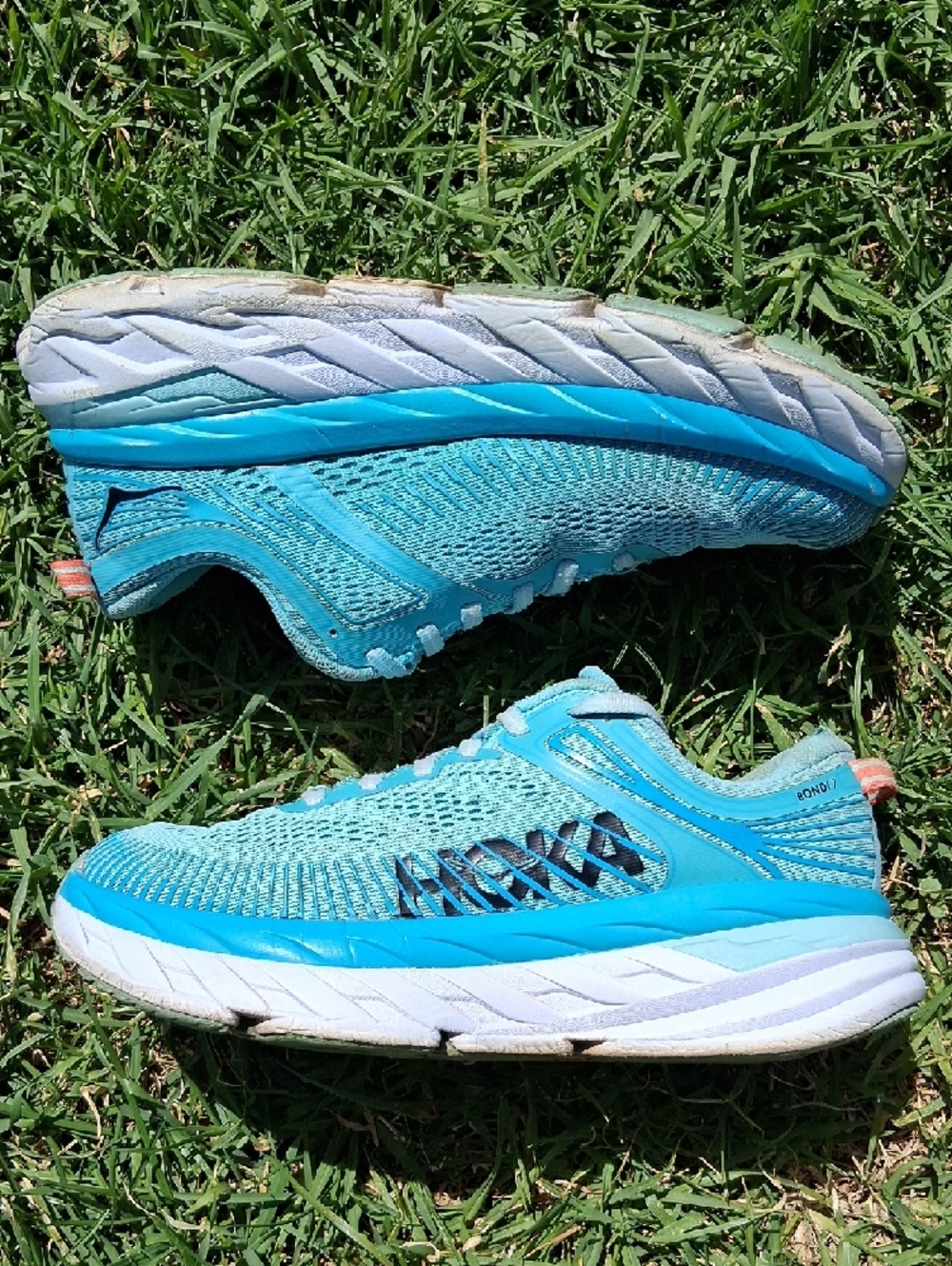 Hoka Bondi 7 turquoise and white running shoes